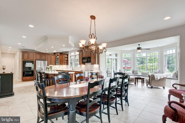 dining area featuring recessed lighting, plenty of natural light, light tile patterned floors, and a ceiling fan