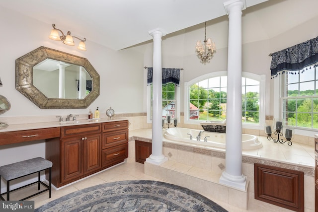 bathroom with ornate columns, a bath, vanity, tile patterned floors, and lofted ceiling