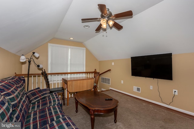living room featuring lofted ceiling, baseboards, and ceiling fan