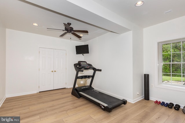 exercise area featuring light wood-type flooring, ceiling fan, baseboards, and recessed lighting