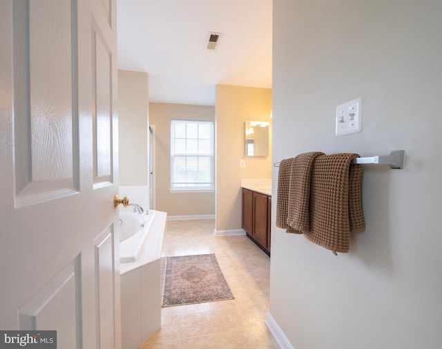 73 Marblehead Rd, Inwood, WV 25428 - full bath with a garden tub, vanity, tile patterned flooring, baseboards, and a shower