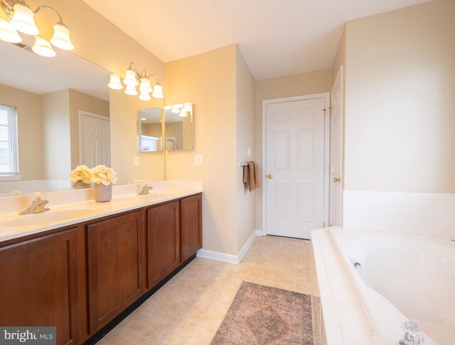 73 Marblehead Rd, Inwood, WV 25428 - bathroom featuring a garden tub, double vanity, tile patterned floors, and a chandelier
