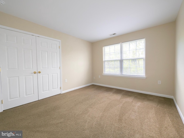 73 Marblehead Rd, Inwood, WV 25428 - unfurnished bedroom featuring carpet floors, baseboards, and a closet