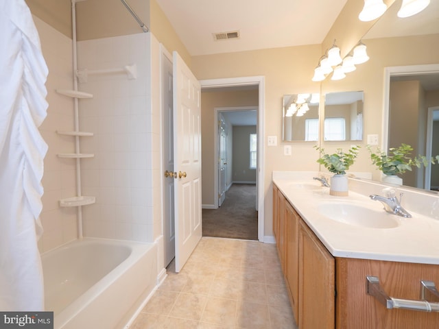 73 Marblehead Rd, Inwood, WV 25428 - full bathroom with tile patterned floors, a chandelier, shower / bath combination, double vanity, and baseboards