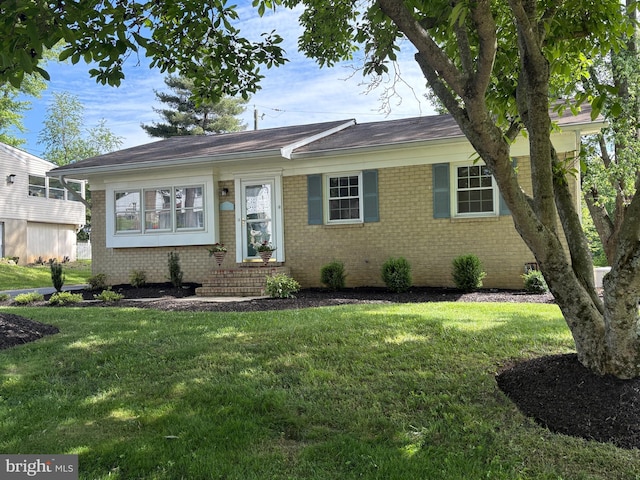 707 Bernadette Dr, Forest Hill, MD 21050 - ranch-style home with brick siding, a front yard, and entry steps