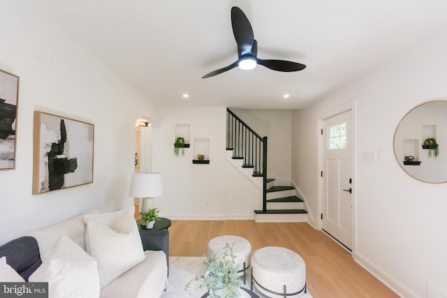 5446 Varnum St, Bladensburg, MD 20710 - living room with wood finished floors, stairway, a ceiling fan, recessed lighting, and baseboards