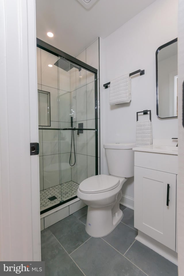 5446 Varnum St, Bladensburg, MD 20710 - full bathroom with toilet, a stall shower, tile patterned floors, vanity, and baseboards
