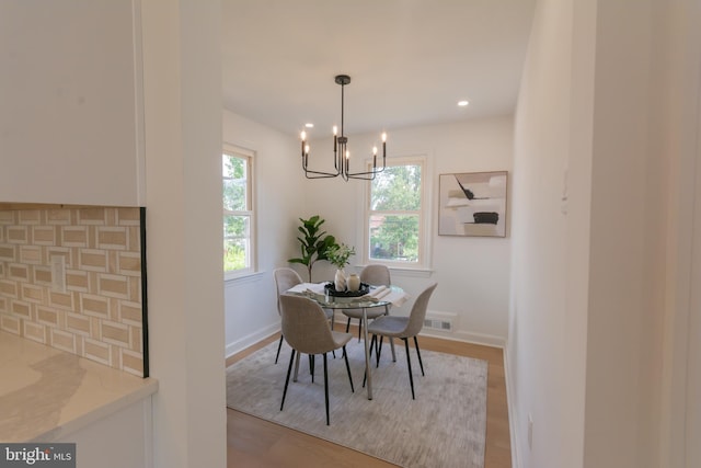 5446 Varnum St, Bladensburg, MD 20710 - dining area with a chandelier, healthy amount of natural light, baseboards, and recessed lighting