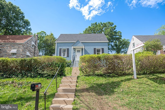 5446 Varnum St, Bladensburg, MD 20710 - view of front of home with brick siding and a front lawn