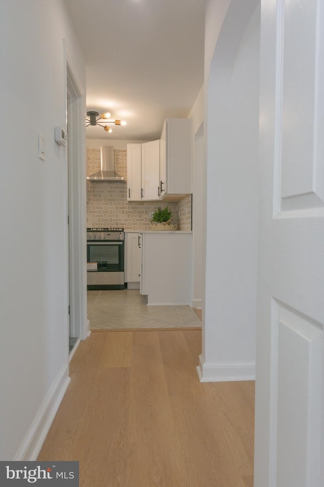 5446 Varnum St, Bladensburg, MD 20710 - hallway featuring light wood-type flooring and baseboards