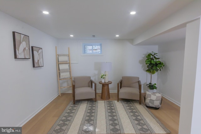 5446 Varnum St, Bladensburg, MD 20710 - living area featuring light wood finished floors, recessed lighting, and baseboards