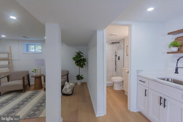 5446 Varnum St, Bladensburg, MD 20710 - bathroom with wood finished floors, a shower stall, toilet, vanity, and recessed lighting