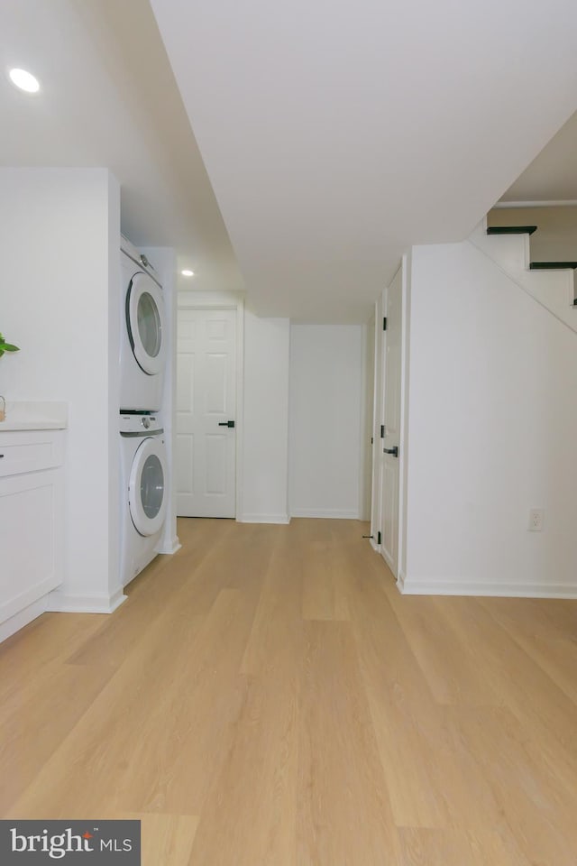 5446 Varnum St, Bladensburg, MD 20710 - washroom with estacked washer and dryer, light wood-style floors, baseboards, and recessed lighting