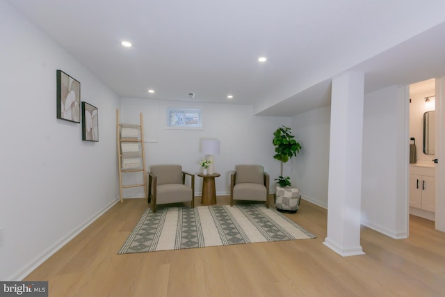 5446 Varnum St, Bladensburg, MD 20710 - living area with wood finished floors, recessed lighting, and baseboards