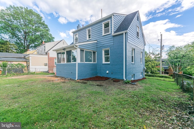 5446 Varnum St, Bladensburg, MD 20710 - rear view of property with brick siding, a chimney, and a sunroom