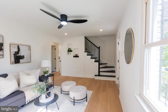 5446 Varnum St, Bladensburg, MD 20710 - living room with wood finished floors, stairs, a ceiling fan, arched walkways, and recessed lighting