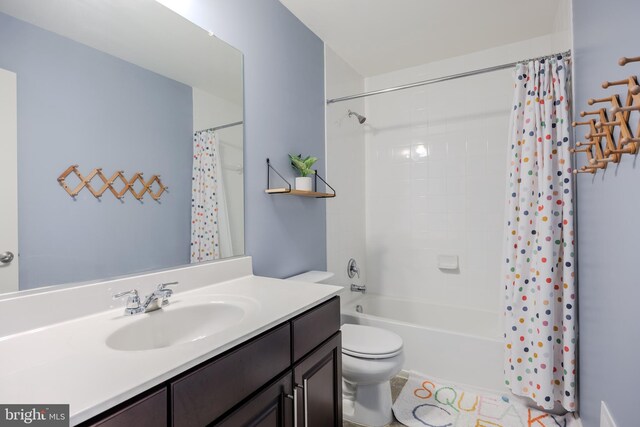 full bath with toilet, vanity, and shower / bathtub combination with curtain