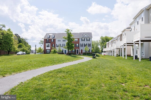 surrounding community featuring a yard