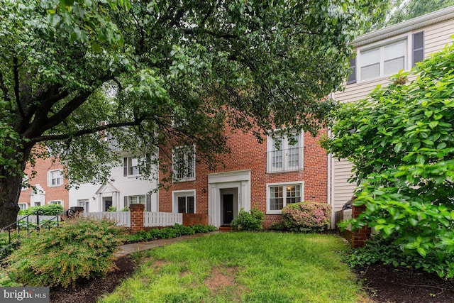 2605 S Walter Reed Dr Unit A, Arlington, VA 22206 - view of front of property featuring brick siding and a front lawn