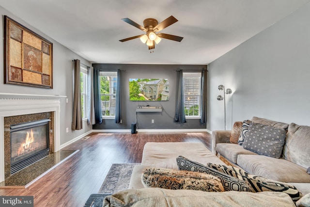 2708 Lake Forest Dr, Upper Marlboro, MD 20774 - living area with a ceiling fan, wood finished floors, a fireplace, and baseboards