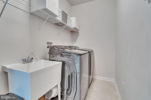 2708 Lake Forest Dr, Upper Marlboro, MD 20774 - washroom featuring washer and dryer and baseboards