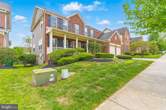 2708 Lake Forest Dr, Upper Marlboro, MD 20774 - view of front facade with brick siding, a front lawn, covered porch, a garage, and concrete driveway