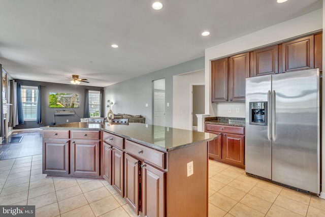 2708 Lake Forest Dr, Upper Marlboro, MD 20774 - kitchen with stainless steel fridge with ice dispenser, a center island, light tile patterned floors, a ceiling fan, and recessed lighting