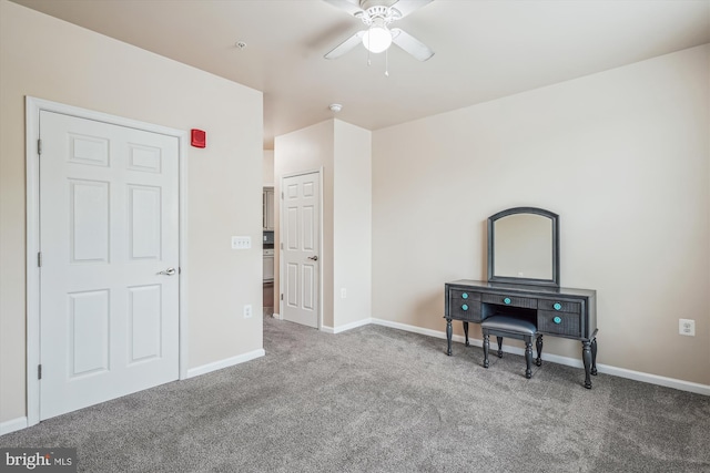 unfurnished bedroom with carpet flooring and baseboards