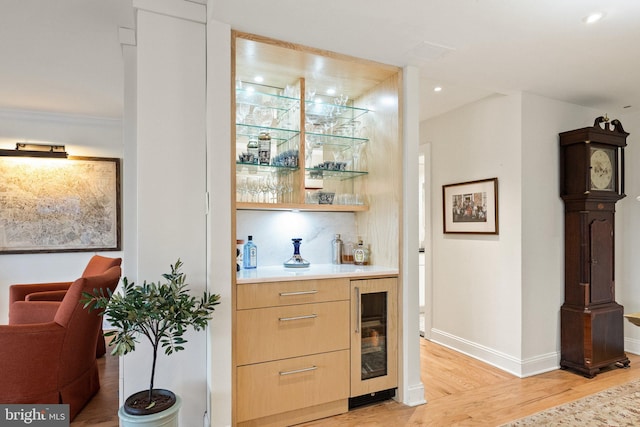 700 New Hampshire Ave NW Unit 507, Washington, DC 20037 - indoor dry bar with light wood-style floors, beverage cooler, baseboards, and recessed lighting