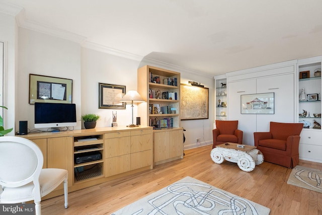 700 New Hampshire Ave NW Unit 507, Washington, DC 20037 - office area featuring light wood finished floors, crown molding, and built in shelves