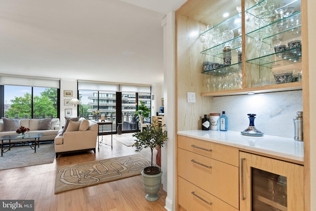 700 New Hampshire Ave NW Unit 507, Washington, DC 20037 - indoor dry bar with wine cooler and wood finished floors
