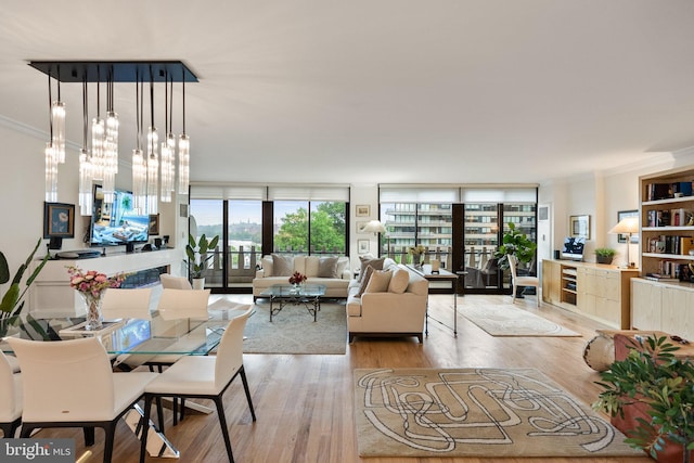 700 New Hampshire Ave NW Unit 507, Washington, DC 20037 - dining space with healthy amount of natural light, light wood-type flooring, crown molding, and expansive windows
