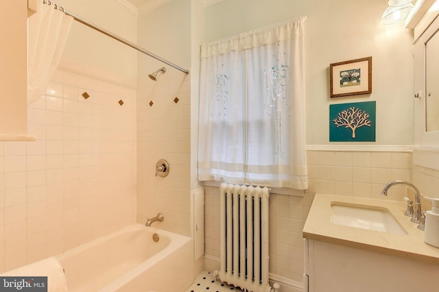 7017 Woodland Ave, Takoma Park, MD 20912 - bathroom with radiator heating unit, tile walls, washtub / shower combination, ornamental molding, and vanity