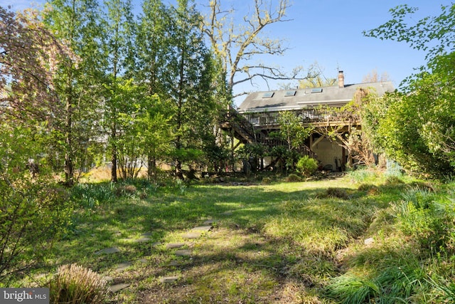 7017 Woodland Ave, Takoma Park, MD 20912 - view of yard featuring a deck and stairway