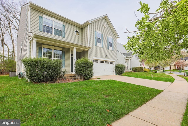 596 Claiborne Road, North East, MD 21901 - traditional-style house featuring a garage, driveway, a front lawn, and central air condition unit