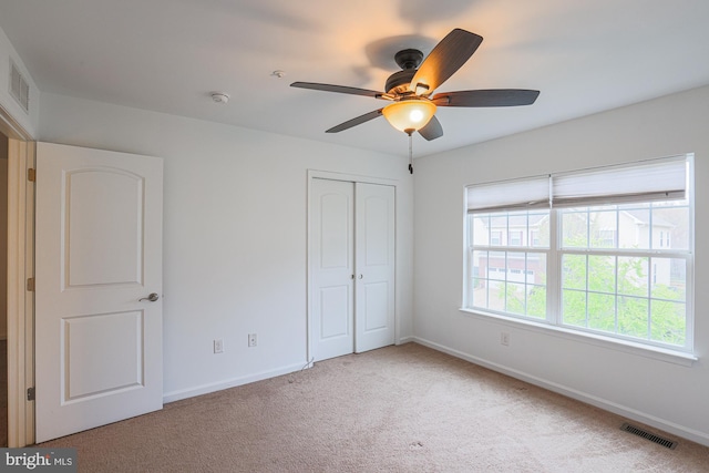596 Claiborne Road, North East, MD 21901 - unfurnished bedroom featuring carpet, baseboards, a closet, and a ceiling fan