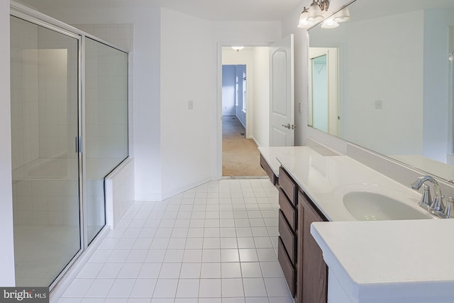 596 Claiborne Road, North East, MD 21901 - full bath with a stall shower, tile patterned flooring, baseboards, and vanity