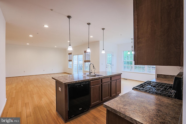 596 Claiborne Road, North East, MD 21901 - kitchen featuring dishwasher, a sink, dark brown cabinetry, range with gas cooktop, and light wood finished floors