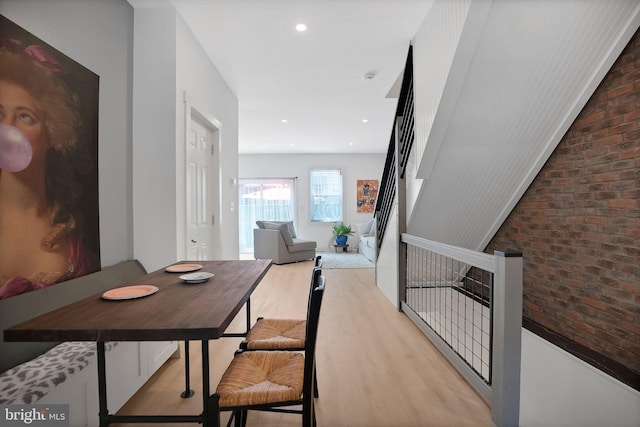 504 Richey Ave, Collingswood, NJ 08107 - dining room featuring wood finished floors, brick wall, and recessed lighting