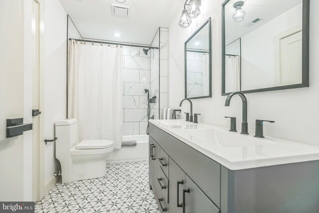 504 Richey Ave, Collingswood, NJ 08107 - full bathroom with double vanity, shower / bath combo with shower curtain, and tile patterned floors