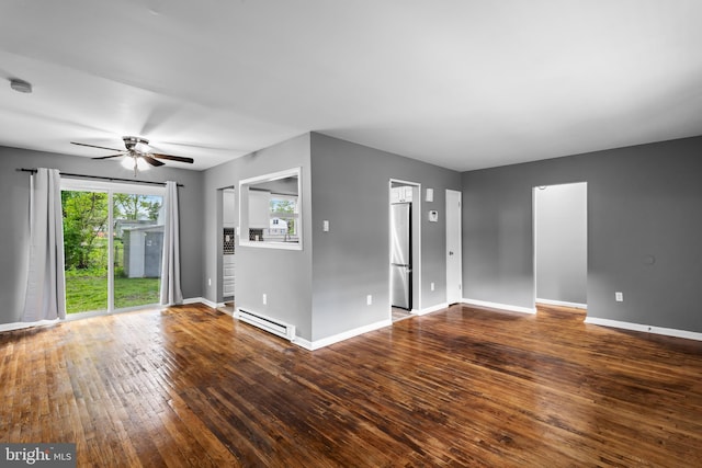 unfurnished living room featuring a baseboard radiator, a ceiling fan, wood-type flooring, and baseboards