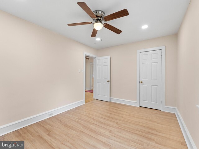 unfurnished bedroom with baseboards, light wood-style flooring, recessed lighting, and ceiling fan