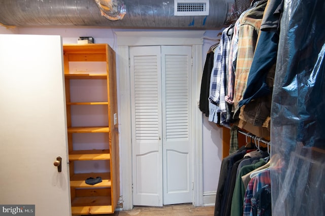 116 Oakley St, Cambridge, MD 21613 - walk in closet with wood finished floors