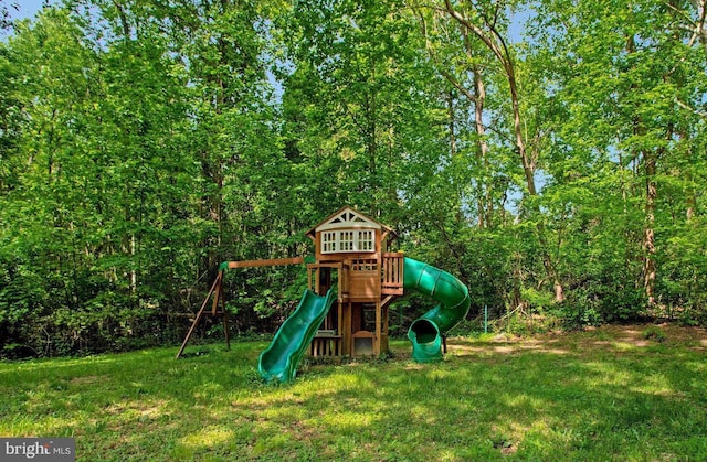 view of playground with a yard