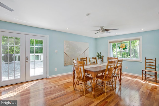 dining space with plenty of natural light, french doors, light wood finished floors, a ceiling fan, and recessed lighting