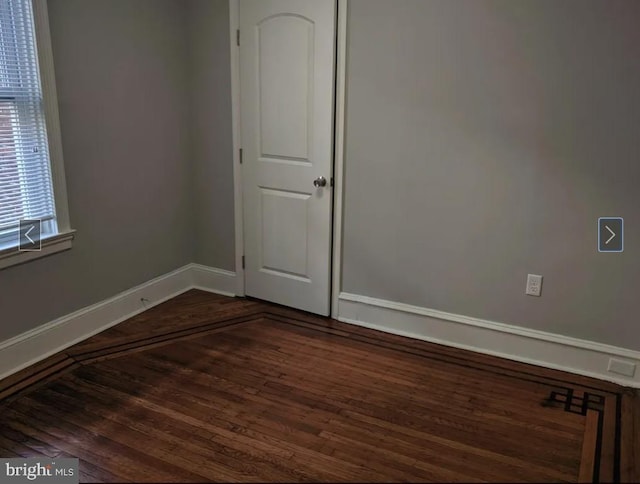 137 S 49th St, Philadelphia, PA 19139 - spare room with dark wood-style flooring and baseboards