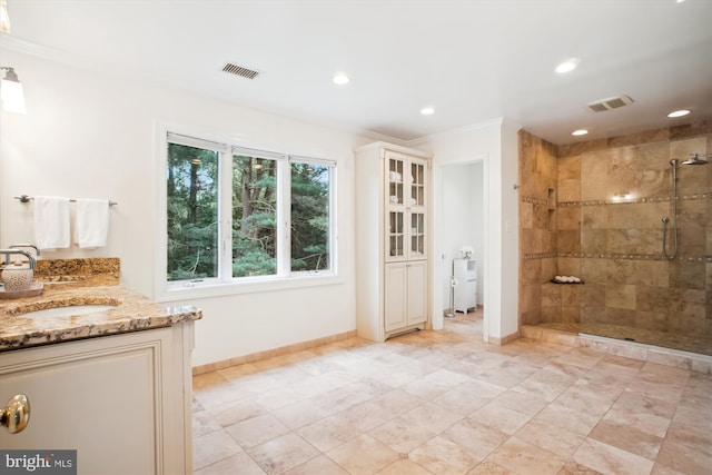 full bath featuring crown molding, a stall shower, recessed lighting, vanity, and baseboards