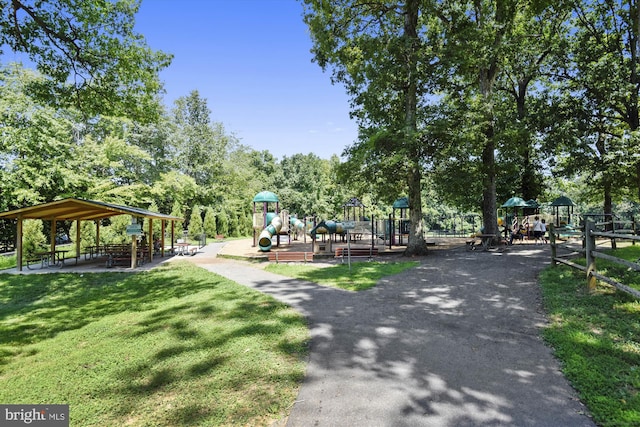 view of property's community featuring a yard and a gazebo