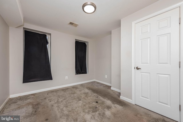 2108 E Hoffman St, Baltimore, MD 21213 - unfurnished room with carpet flooring, baseboards, and visible vents