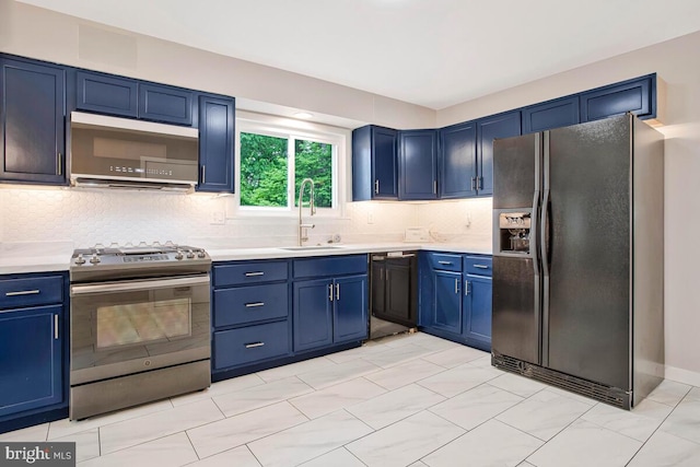 kitchen with black appliances, a sink, blue cabinets, light countertops, and backsplash
